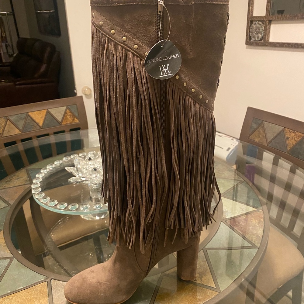 Brand New INC shingle studded healed boots.